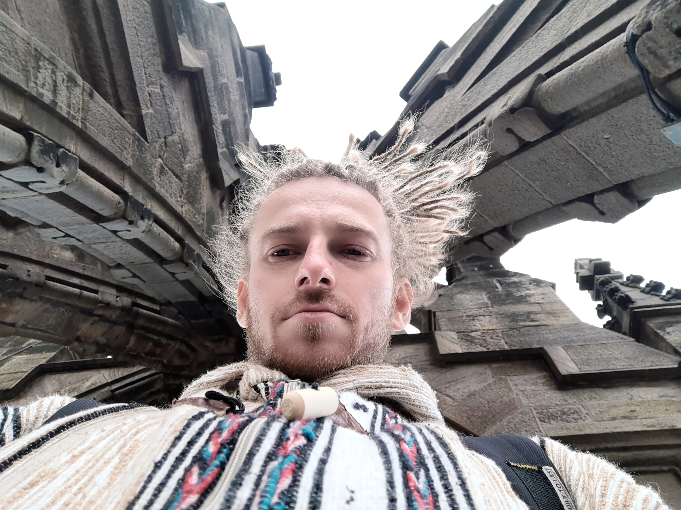 Picture of Matt with blond dreads and a big smile